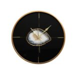 Modern round wall clock with a black finish, gold markers, and a natural agate slice centrepiece, perfect for contemporary interiors.