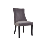 Grey velvet dining chair with button-tufted backrest, stud detailing, and solid black wood legs.