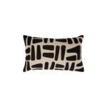 Rectangular black and natural cotton cushion with tribal geometric patterns, designed to complement boho-inspired interiors.