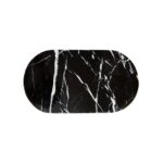 Oval black marble serving board with white veining, perfect for elegant dining and decor.