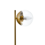 Contemporary gold table lamp with a clear glass globe and a black marble base, ideal for modern and mid-century interiors.