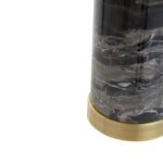 Elegant black marble table lamp with a warm metallic base and ivory shade, perfect for modern and transitional interiors.