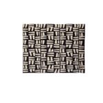 A stylish natural and black throw with a geometric tribal pattern, crafted from soft polyester for a cosy and modern home décor touch.