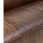 NOLAN Tan Three-Seater Sofa with genuine leather upholstery in Mexico brown, minimalist design with track arms and rubberwood legs.