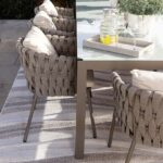 MARIE Rug – Elegant wave-patterned indoor/outdoor rug in soft greys, browns, and taupe, crafted from durable polyester.