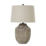Ochre Carved Table Lamp with linen shade, featuring an artisanal ceramic base, perfect for rustic, boho, and farmhouse interiors.