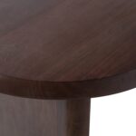 ELLIPS Dining Table – A mango wood dining table with a warm walnut finish, featuring a modern flattened-edge design.