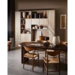 ELLIPS Dining Table – A mango wood dining table with a warm walnut finish, featuring a modern flattened-edge design.