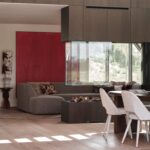 ELLIPS Dining Table – A mango wood dining table with a warm walnut finish, featuring a modern flattened-edge design.