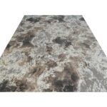 INAYA Rug – Abstract modern rug with cloud-like patterns in brown, white, and grey, crafted from plush polyester.