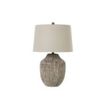Ochre Carved Table Lamp with linen shade, featuring an artisanal ceramic base, perfect for rustic, boho, and farmhouse interiors.