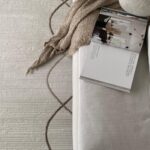 LYNNE Rug – Modern abstract brown circular weave rug with a plush 12mm pile height, crafted from durable polyester.