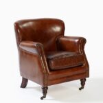 GAVORE Brown Leather Armchair with aged leather and compact design, perfect for corners, reading, or use as a shoe-changing seat.