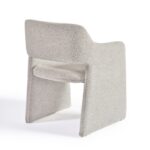 Modern dining chair upholstered in greyish bouclé fabric with a curved, architectural design and integrated arms.