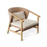 ARCADIA outdoor armchair in aged teak with resin seat and backrest.
