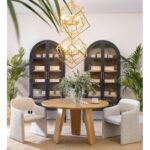 Round light oak dining table with three-panel base – Helsinki design