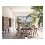 Taupe upholstered dining chair with curved backrest and minimalist design, perfect for modern or transitional dining spaces.