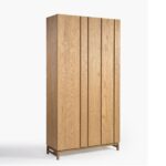 Natural oak three-door wardrobe with minimalist design and gold metal base, featuring four internal shelves for organized bedroom storage.