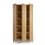 Natural oak three-door wardrobe with minimalist design and gold metal base, featuring four internal shelves for organized bedroom storage.