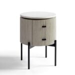 Round greyish-white oak side table with white stone top, black metal legs, and a storage drawer—modern and minimal bedside table design.