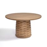 Round oak dining table with sculptural weaved pedestal base, made from natural oak wood with a distinctive design ideal for stylish dining rooms.