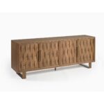 Natural oak wood sideboard with four sculpted relief doors and aged gold metal legs, offering elegant storage for living or dining spaces.