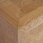 Natural oak wood side table with minimalist design and square top—ideal for modern or Scandinavian interiors.