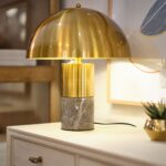 FLAIR gold mushroom table lamp with white marble base for modern and elegant interiors.