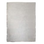 Soft off-white wave-patterned throw with grey accents, ideal for cozy chalet-inspired decor.