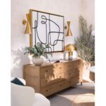 ANNE wall sconce in antique gold finish with geometric metal design.