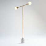 ALEXA gold metal floor lamp with two glass globes and a white marble base.