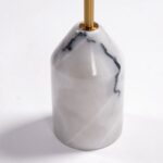 ALEXA gold metal floor lamp with two glass globes and a white marble base.