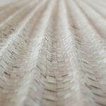 ERIK Woven Palm Wall Art with oak veneer frame and three-dimensional palm texture by Versmissen.