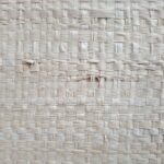 ERIK Woven Palm Wall Art with oak veneer frame and three-dimensional palm texture by Versmissen.