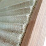 ERIK Woven Palm Wall Art with oak veneer frame and three-dimensional palm texture by Versmissen.