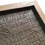 Square woven palm wall art in oak frame with light and dark brown tones, by Versmissen.