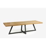 DIAGO oak dining table with textured oak top and black central metal base.