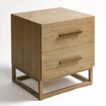 MONICA oak bedside table with two drawers and aged gold metal base and handles.