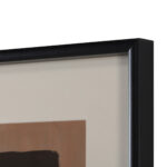 Set of two abstract framed canvas artworks in orange, beige, and brown with black frames.