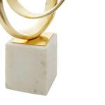 Gold knot sculpture on white marble base – elegant contemporary décor accent.