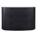 Black-brown oak oval chest of drawers with white stone top and three drawers with metal handles.