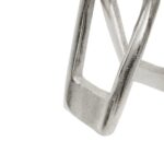 Small handcrafted nickel finish aluminium sculpture with textured surface.