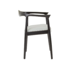 Grey leather chair with black teak frame, open back design, and metallic stud detailing—blending elegance with everyday comfort.