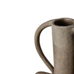Small grey aluminium vase with a textured finish and angular curves, blending industrial and contemporary style.