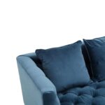 Three-seat navy Chesterfield-style fabric sofa with button tufting and gold-accented wooden legs.