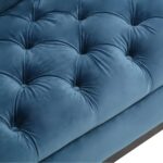 Three-seat navy Chesterfield-style fabric sofa with button tufting and gold-accented wooden legs.