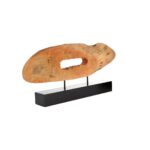 Natural mango wood slice sculpture with hollow centre on black iron base.