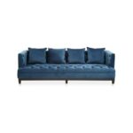 Three-seat navy Chesterfield-style fabric sofa with button tufting and gold-accented wooden legs.