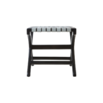 Teak wood stool with woven grey leather straps and black-stained scrolled legs, blending boho style with natural sophistication.