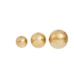 Set of three metallic gold and silver gradient decorative aluminium spheres.